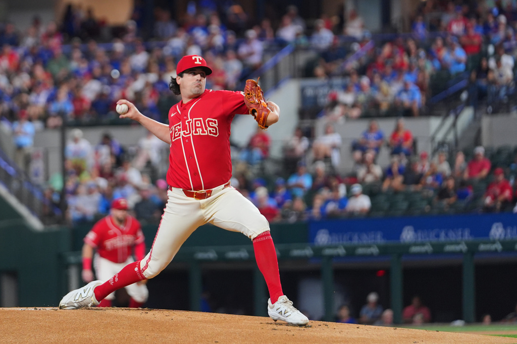 Texas Rangers starting pitcher Cal Quantrill throws to the Toronto Blue Jays during the first inning of a baseball game Saturday, Sept. 19, 2026, in Arlington, Texas. (AP Photo/Julio Cortez)
