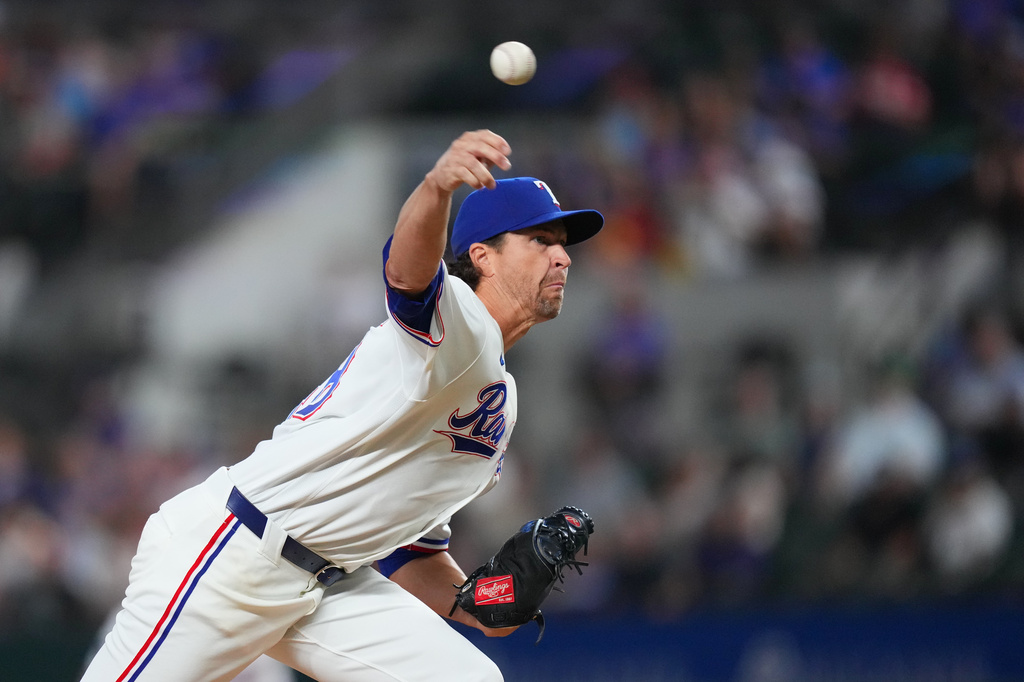 Texas Rangers starting pitcher Jacob deGrom throws to the Boston Red Sox during the first inning of a baseball game Tuesday, Sept. 15, 2026, in Arlington, Texas. (AP Photo/Julio Cortez)