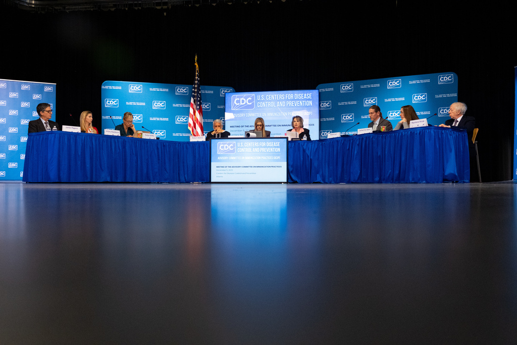 The CDC Advisory Committee on Immunization Practices meets in Atlanta on Friday, Dec. 5, 2025 to consider changes in hepatitis B vaccine recommendations for infants. (AP Photo/Ben Gray)
