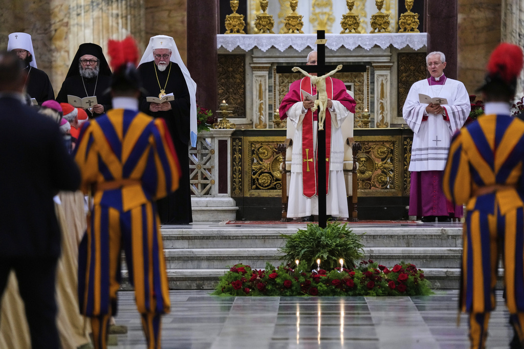 Pope Leo XIV presides over a commemoration of the martyrs and witnesses of the faith of the 21st century with representatives of other churches and Christian communions in the Basilica of St. Paul Outside the Walls in Rome, Sunday, Sept. 14, 2025. (AP Photo/Gregorio Borgia)