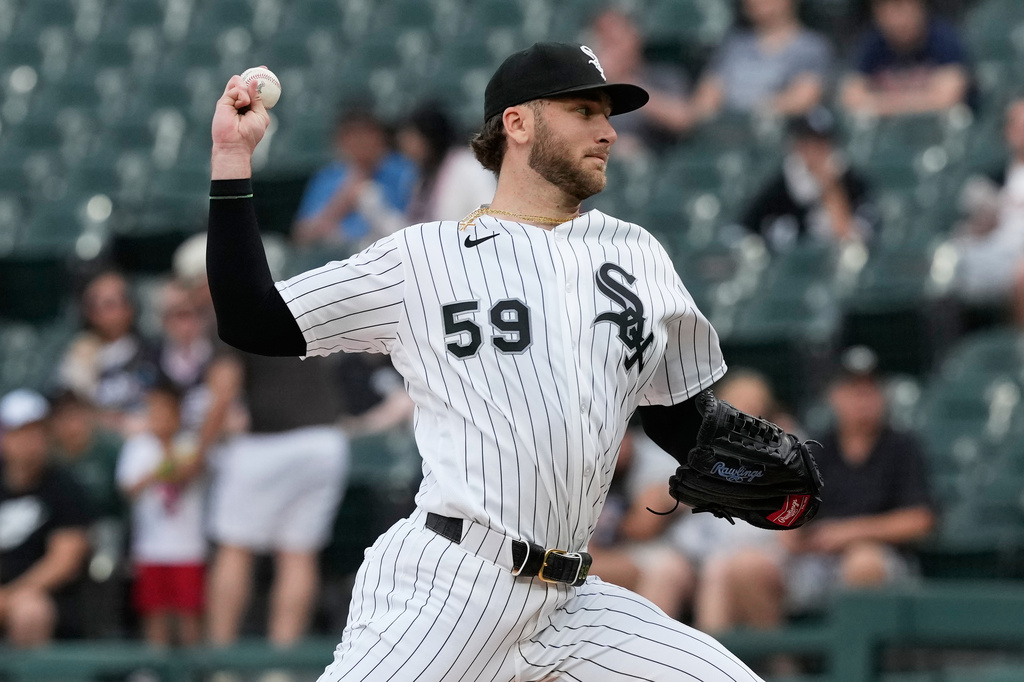 Chicago White Sox starting pitcher Sean Burke throw against the Minnesota Twins during the first inning of a baseball game in Chicago, Tuesday, May 26, 2026. (AP Photo/Nam Y. Huh)