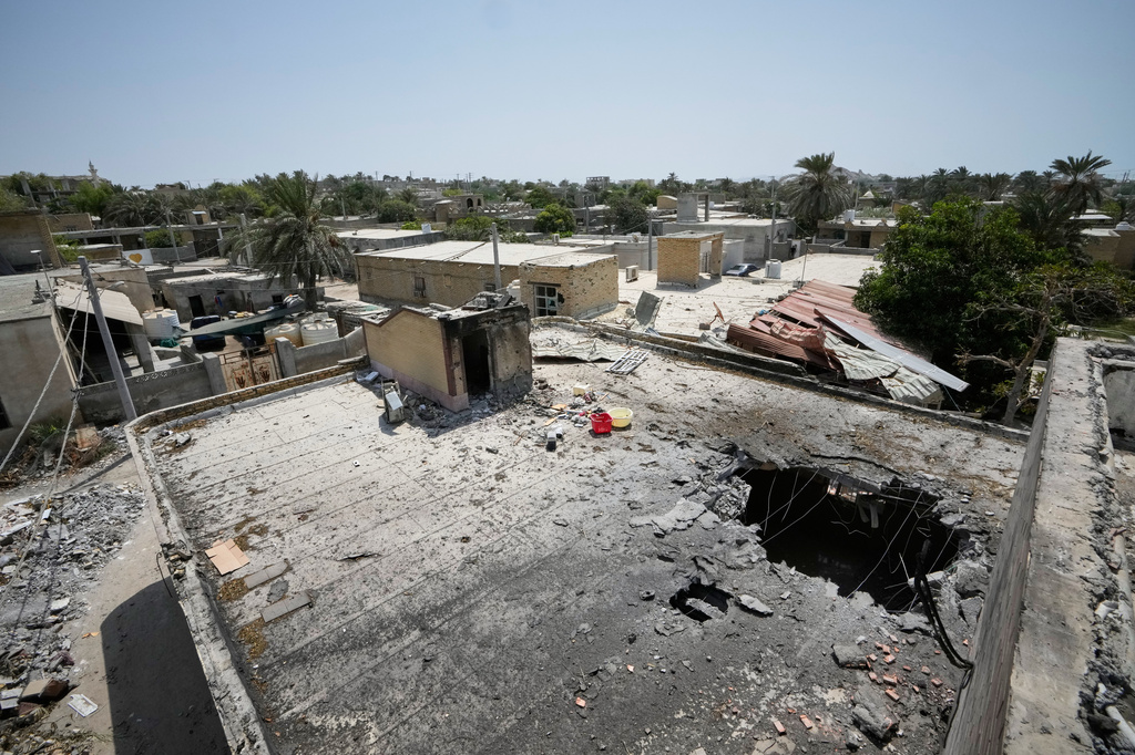 The point of impact is seen on the roof of a building that Iranian media said was hit by a U.S. strike while a wedding celebration was taking place there late Tuesday, Sept. 1, in Kuhestak, southern Iran, Friday, Sept. 4, 2026. (AP Photo/Vahid Salemi)