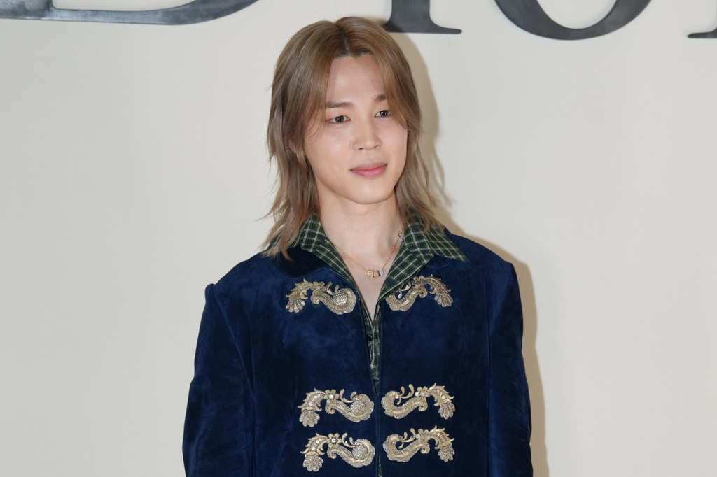 Jimin poses for photographers at the photo call for the Dior Homme Spring Summer 2027 collection presented in Paris, France, Wednesday, June 24, 2026. (AP Photo/Aurelien Morissard)