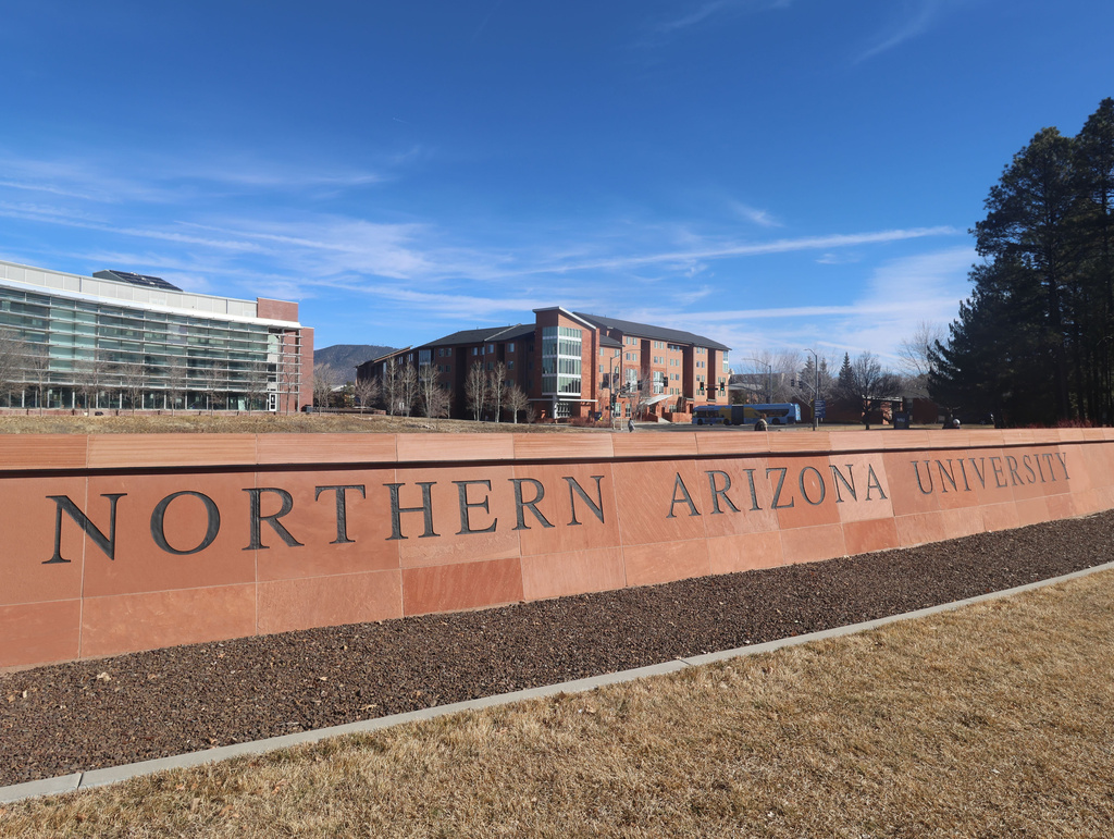 FILE - A sign is displayed for the Northern Arizona University campus in Flagstaff, Ariz., Feb. 2, 2026. (AP Photo/Cheyanne Mumphrey, File)