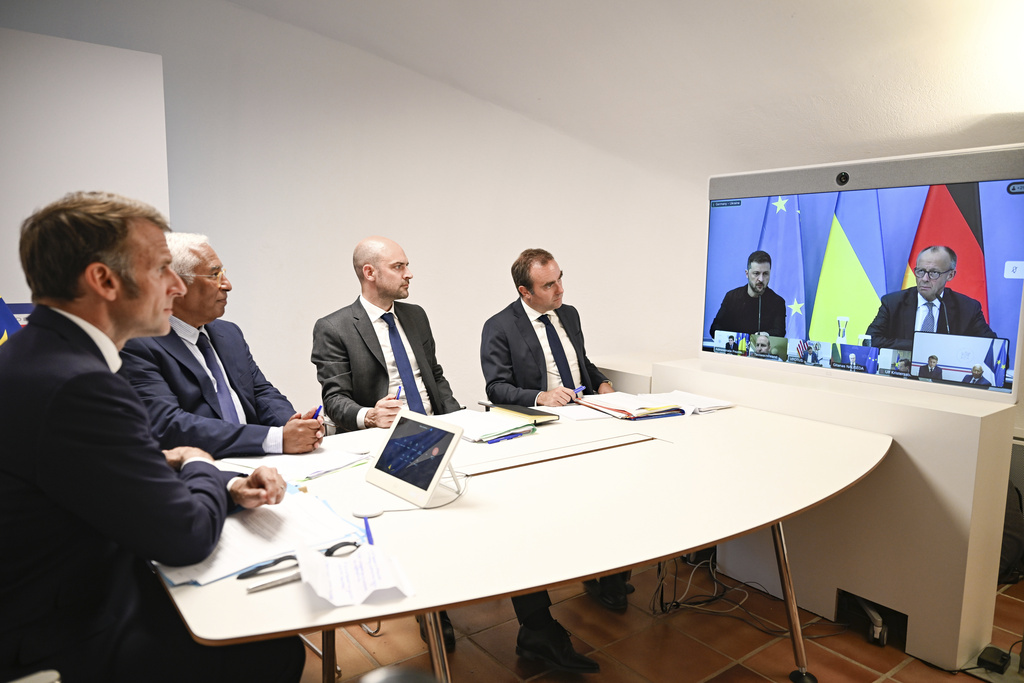 French President Emmanuel Macron, left, Antonio Costa, President of the European Council, second left, French Foreign Minister Jean-Noel Barrot, third right, and French Defense Minister Sebastien Lecornu, attend a video conference on Ukraine at the Fort de Bregancon in Bormes-les-Mimosas, southern France, Wednesday Aug.13, 2025. (Philippe Magoni, Pool via AP)