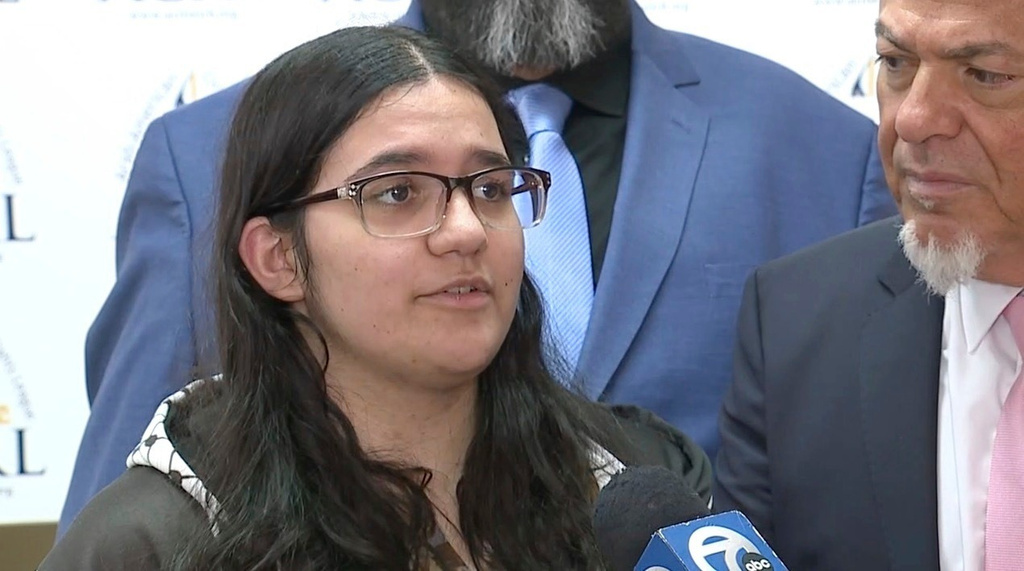 FILE - In this screengrab made from video provided by WXYZ-TV, Danielle Khalaf, who said she was humiliated by her teacher after declining to stand for the Pledge of Allegiance in protest of U.S. support of Israel against Palestinians, appears at a news conference on Feb. 27, 2025, in Detroit. (WXYZ-TV via AP, File)