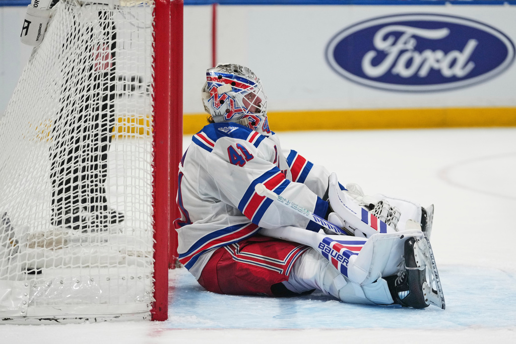 New York Rangers goaltender Spencer Martin (41) reacts after New York Islanders' Mathew Barzal scored a goal during the second period of an NHL hockey game Wednesday, Jan. 28, 2026, in Elmont, N.Y. (AP Photo/Frank Franklin II)