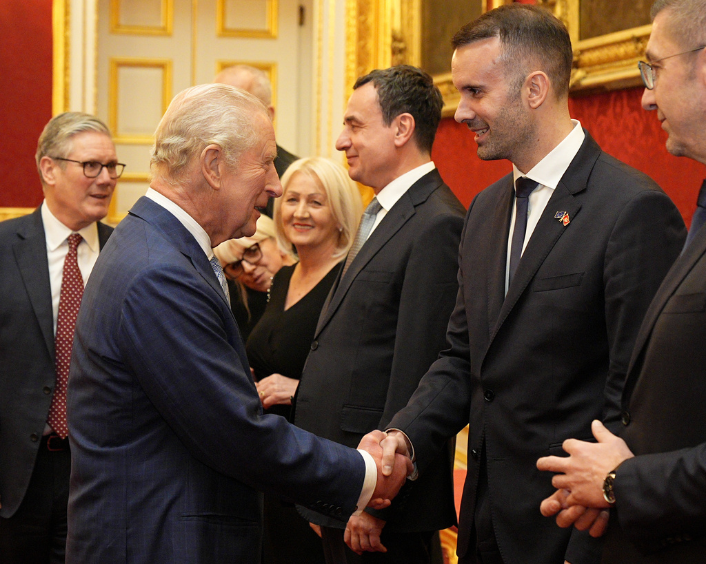 Britain's King Charles III greets the Prime Minister of Montenegro Milojko Spajic, during a reception for Western Balkans leaders at St James's Palace, London, Tuesday, Oct. 21, 2025, on the eve of the Western Balkans Leaders' Summit. (Aaron Chown/Pool Photo via AP)