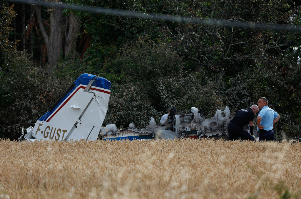 Forensic technicians examine the wreckage of the Cessna 421 piloted by Ubisoft co-founder Claude Guillemot, who was killed when the aircraft crashed while approaching La Baule-Escoublac airfield Friday evening in La Baule, western France, Saturday, June 20, 2026. (AP Photo/Jeremia Gonzalez)