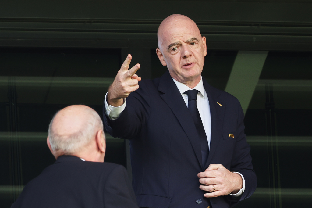 FIFA President Gianni Infantino gestures as he attends the Women's U20 World Cup opening match between Poland and Argentina in Katowice, Poland, Saturday, Sept. 5, 2026. (AP Photo/Beata Zawrzel)