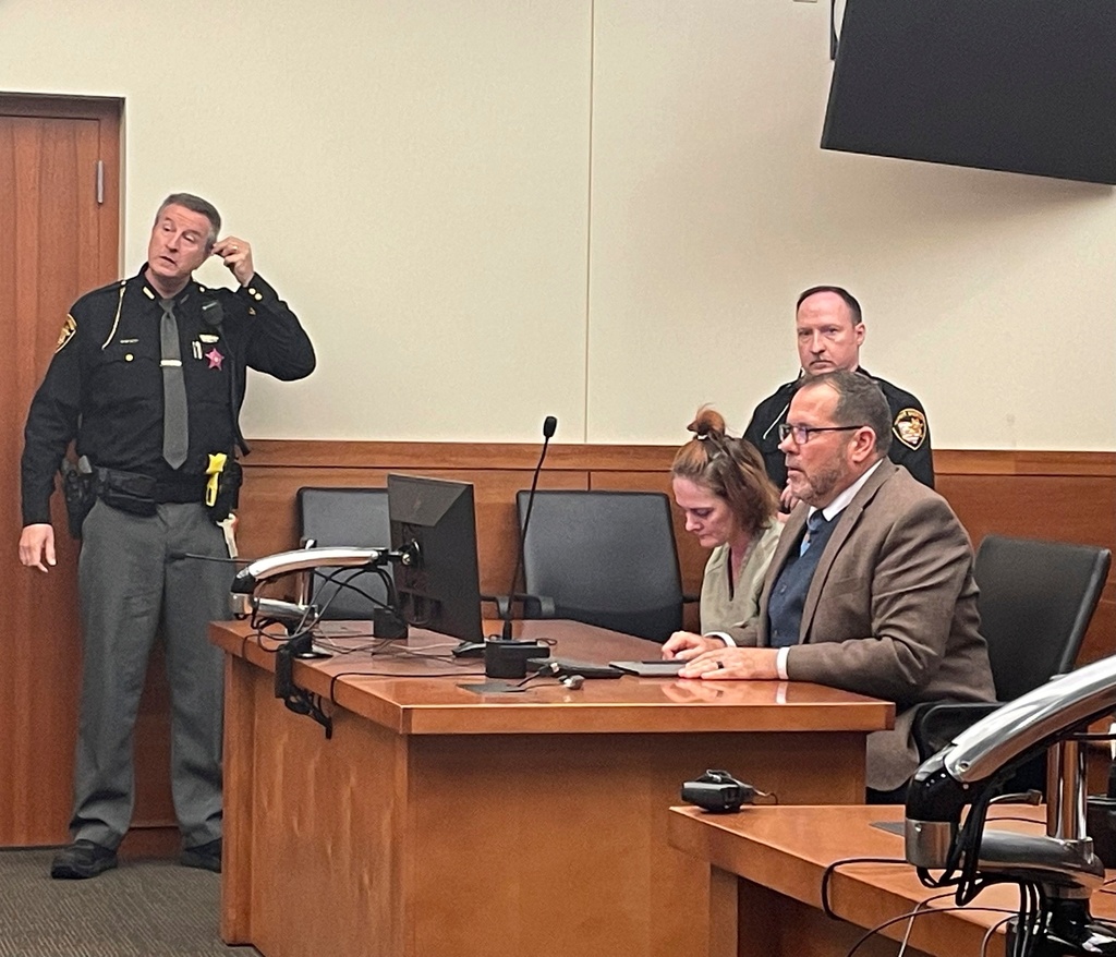 FILE - Rebecca Auborn, accused of killing four men by fatally drugging them to steal their possessions, sits in a Franklin County courtroom in Columbus, Ohio, alongside her attorney, Mark Hunt, Oct. 30, 2023. (AP Photo/Samantha Hendrickson, File)