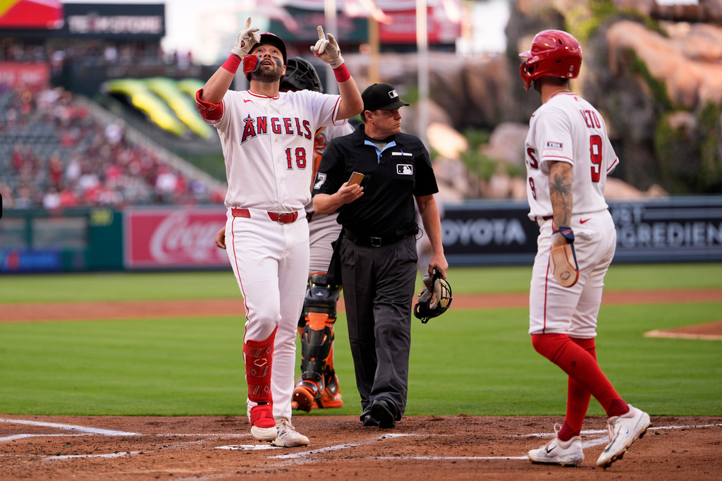 Los Angeles Angels' Nolan Schanuel, left, gestures as he scores after hitting a two-run home run as Zach Neto waits for him during the first inning of a baseball game against the Baltimore Orioles, Tuesday, June 23, 2026, in Anaheim, Calif. (AP Photo/Mark J. Terrill)