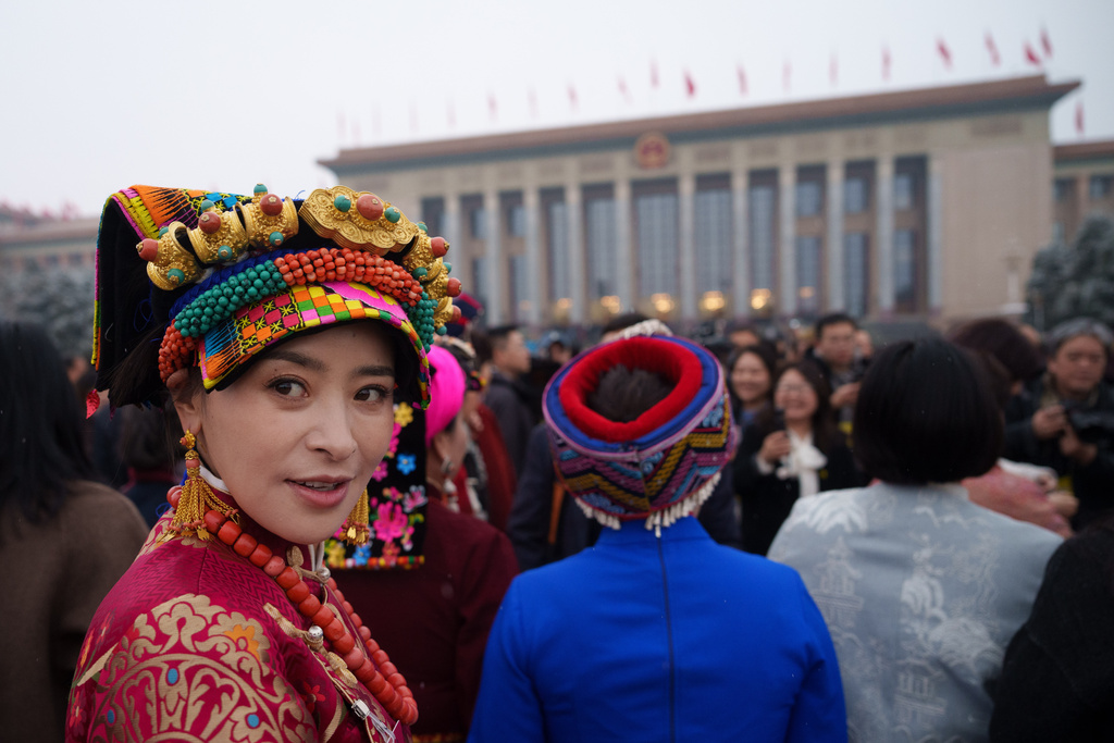 Ethnic minority delegates arrive to attend the opening session of the National People's Congress (NPC) in Beijing, China, Thursday, March 5, 2026. (AP Photo/Vincent Thian)