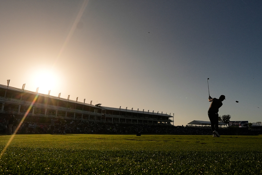 Si Woo Kim of South Korea drives off the 17th tee during the second round of The Players Championship golf tournament Friday, March 13, 2026, in Ponte Vedra Beach, Fla. (AP Photo/Gerald Herbert)