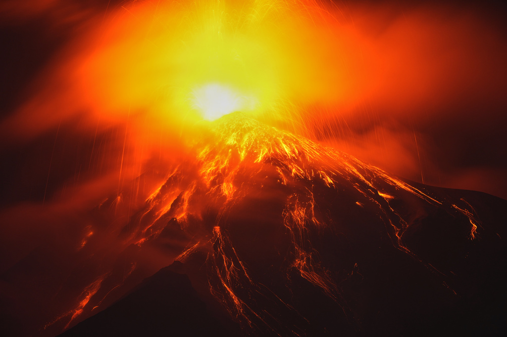 Lava flows out of the crater of the Fuego Volcano, as seen from San Juan Alotenango, Guatemala, Tuesday, Aug. 4, 2026. (AP Photo/Moises Castillo)