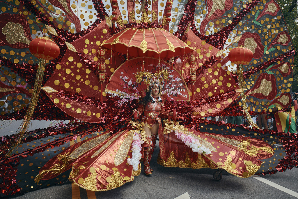 FILE - A reveler marches in the West Indian Day Parade on Sept. 2, 2024, in the Brooklyn borough of New York. (AP Photo/Andres Kudacki, File)