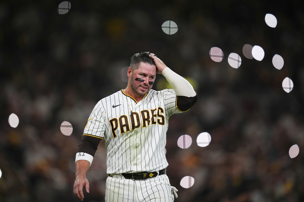 San Diego Padres' Ty France reacts after he was forced out by Milwaukee Brewers second baseman Brice Turang during the sixth inning in Game 4 of baseball's National League Division Series Wednesday, Oct. 7, 2026, in San Diego. (AP Photo/Gregory Bull)