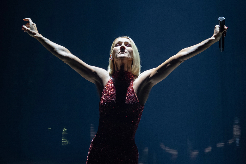 FILE - Singer Celine Dion performs during her first World Tour called Courage in Quebec City, Montreal, Canada on Sept. 18, 2019. (Jacques Boissinot/The Canadian Press via AP)