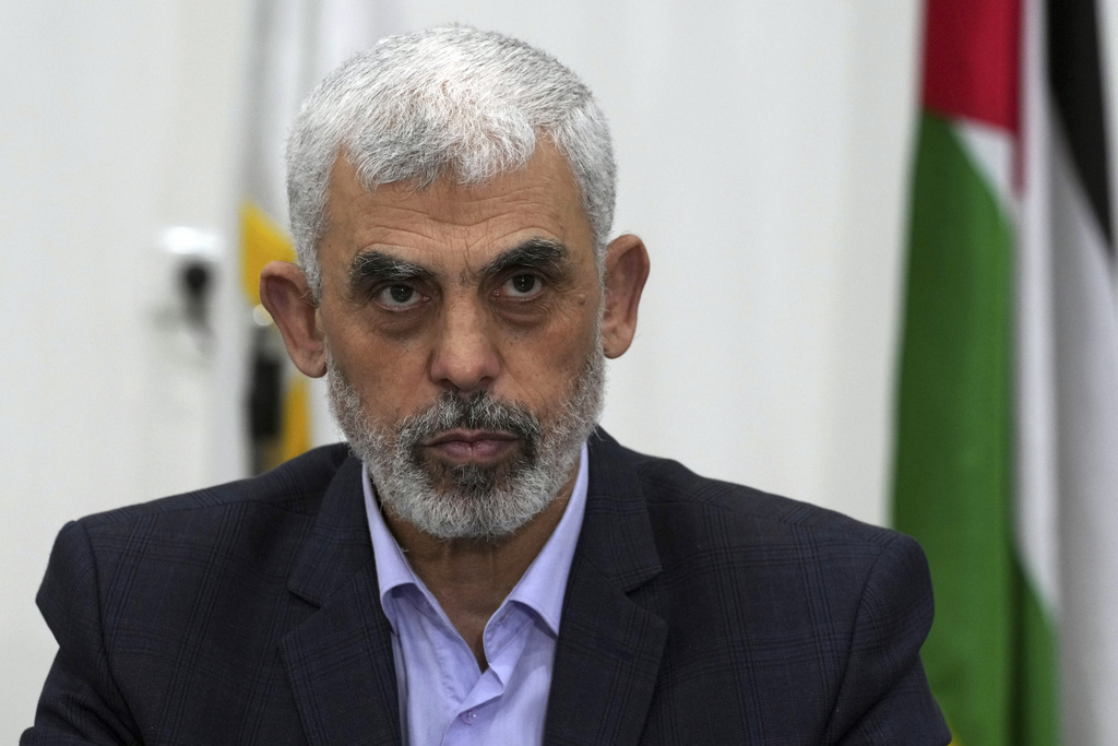 FILE - Yahya Sinwar, head of Hamas in Gaza, chairs a meeting with leaders of Palestinian factions at his office in Gaza City, April 13, 2022. (AP Photo/Adel Hana, File)