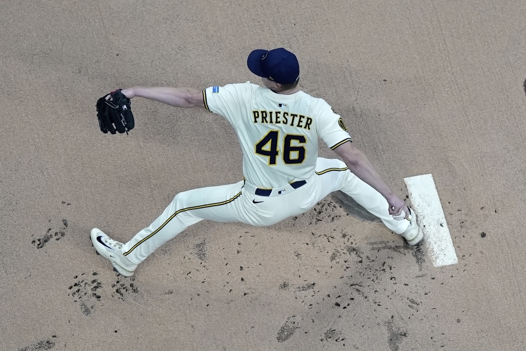 Milwaukee Brewers' Quinn Priester throws during the first inning of a baseball game against the Los Angeles Angels Thursday, Sept. 18, 2025, in Milwaukee. (AP Photo/Morry Gash)