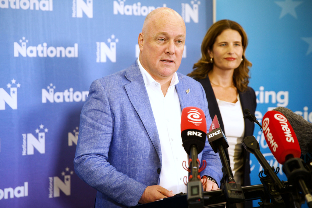 New Zealand Prime Minister Christopher Luxon announces the 2026 election date at the National annual away caucus in Christchurch Wednesday, Jan 21, 2026, as Finance Minister Nicola Willis, right, looks on. (Alden Williams/STUFF via AP)