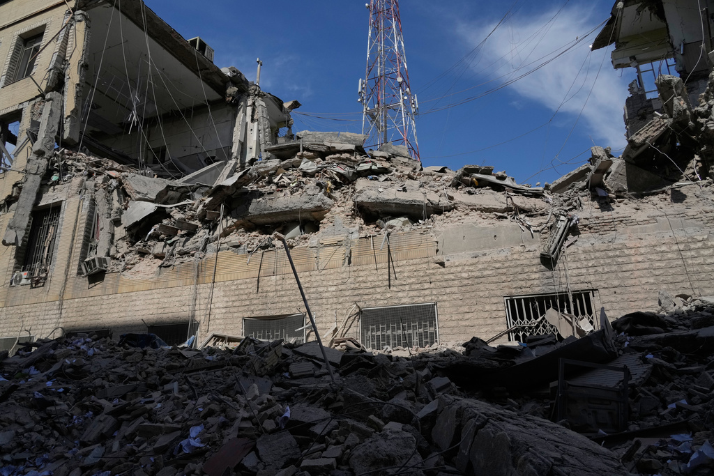 The rubble of a police facility struck during the U.S.–Israeli military campaign is seen in Tehran, Iran, Wednesday, March 4, 2026. (AP Photo/Vahid Salemi)