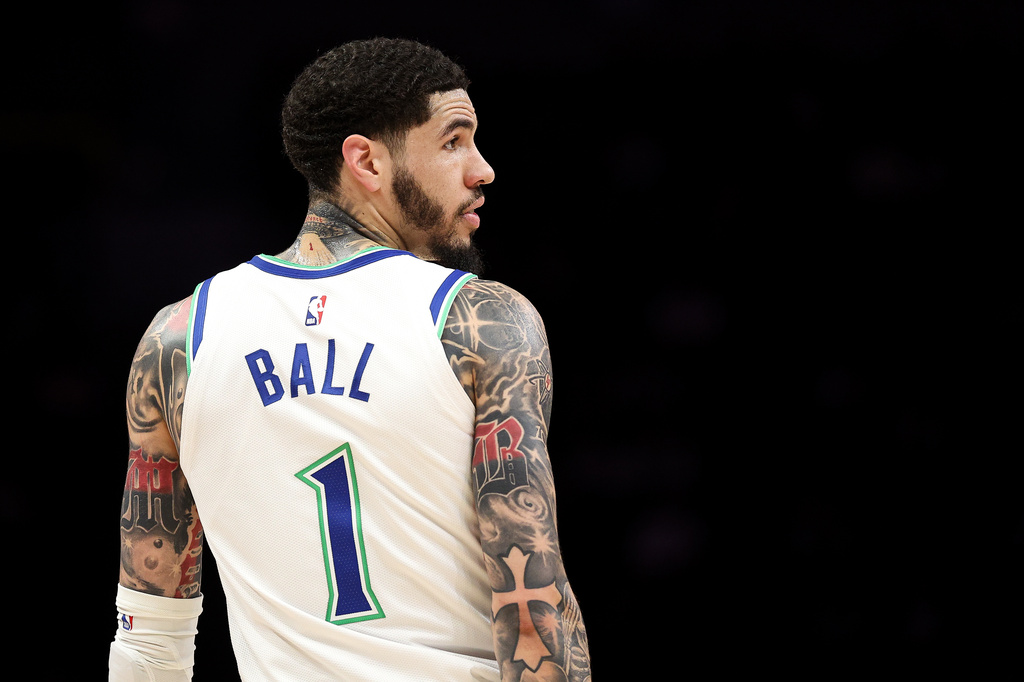 Minnesota Timberwolves guard LaMelo Ball (1) looks on during the first half of a preseason NBA basketball game against the Detroit Pistons Wednesday, Oct. 14, 2026, in Minneapolis. (AP Photo/Matt Krohn)