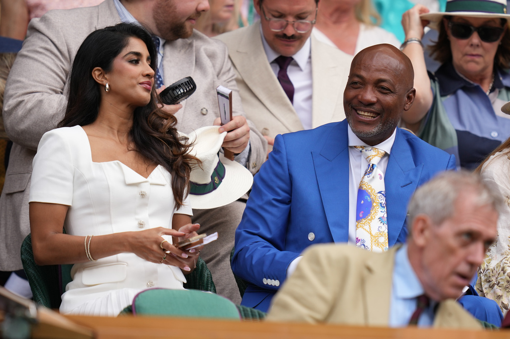 Former West Indies cricketer Brian Lara watch the men's singles semifinal match between Arthur Fery of Britain and Alexander Zverev of Germany from the Royal Box on Centre Court at the Wimbledon Tennis Championships in London, Friday, July 10, 2026. (AP Photo/Kirsty Wigglesworth)