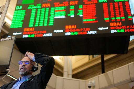 Options trader Steven Rodriguez works on the floor at the New York Stock Exchange in New York, Wednesday, Oct. 29, 2025. (AP Photo/Seth Wenig) Options trader Steven Rodriguez works on the floor at the New York Stock Exchange in New York, Wednesday, Oct. 29, 2025. (AP Photo/Seth Wenig)