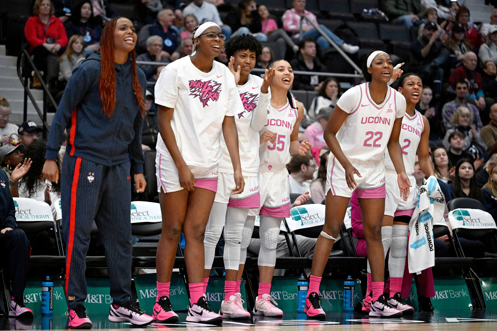 UConn players celebrate a basket in the second half of an NCAA college basketball game against Butler, Saturday, Feb. 7, 2026, in Hartford, Conn. (AP Photo/Jessica Hill)