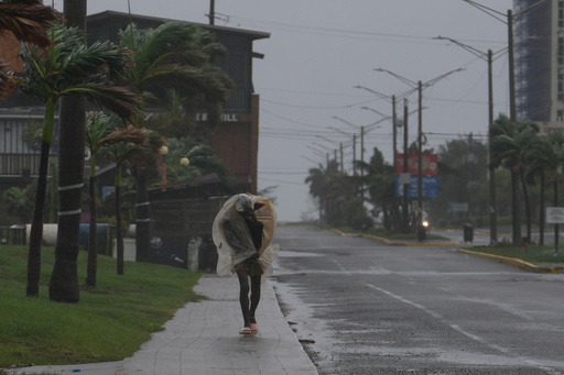 A man walks in Kingston, Jamaica, as Hurricane Melissa approaches, Tuesday, Oct. 28, 2025. (AP Photo/Matias Delacroix) A man walks in Kingston, Jamaica, as Hurricane Melissa approaches, Tuesday, Oct. 28, 2025. (AP Photo/Matias Delacroix)