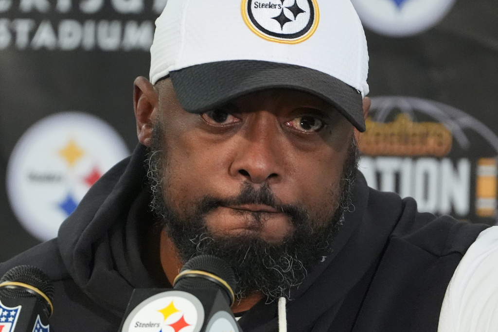 Former Pittsburgh Steelers head coach Mike Tomlin talks with reporters following an NFL wild-card playoff game against the Houston Texans in Pittsburgh, Monday, Jan. 12, 2026. (AP Photo/Gene J. Puskar)