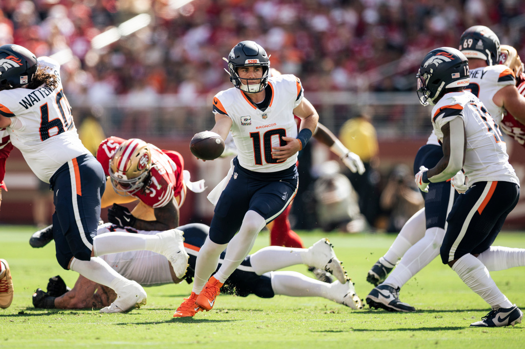 Denver Broncos quarterback Bo Nix (10) looks to pass the ball during the first half of an NFL football game against the San Francisco 49ers in Santa Clara, Calif., Sunday, Oct. 4, 2026. (Stephen Lam/San Francisco Chronicle via AP)
