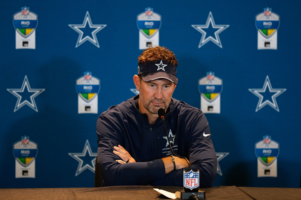 Dallas Cowboys head coach Brian Schottenheimer speaks during a press conference after an NFL football game against the Baltimore Ravens in Rio de Janeiro, Sunday, Sept. 27, 2026. (AP Photo/Fernando Llano)