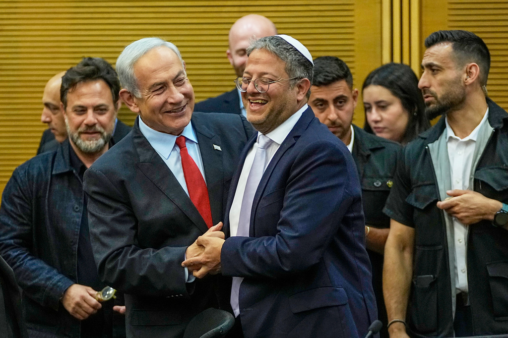 FILE - Israeli Prime Minister Benjamin Netanyahu and Israel's National Security Minister Itamar Ben-Gvir smile in the Knesset, Israel's parliament in Jerusalem, May 23, 2023. (AP Photo/Ohad Zwigenberg, File)