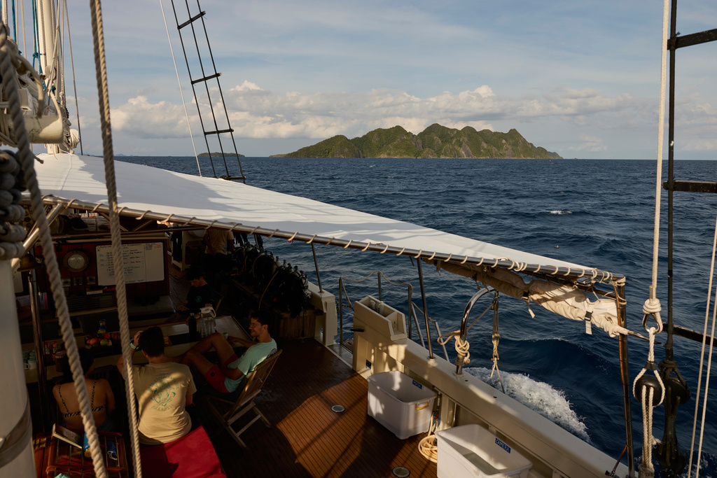 Misool Island is visible from the Raja Laut dive boat in Raja Ampat, Indonesia, Sunday, March 1, 2026. (AP Photo/Claudia Rosel)