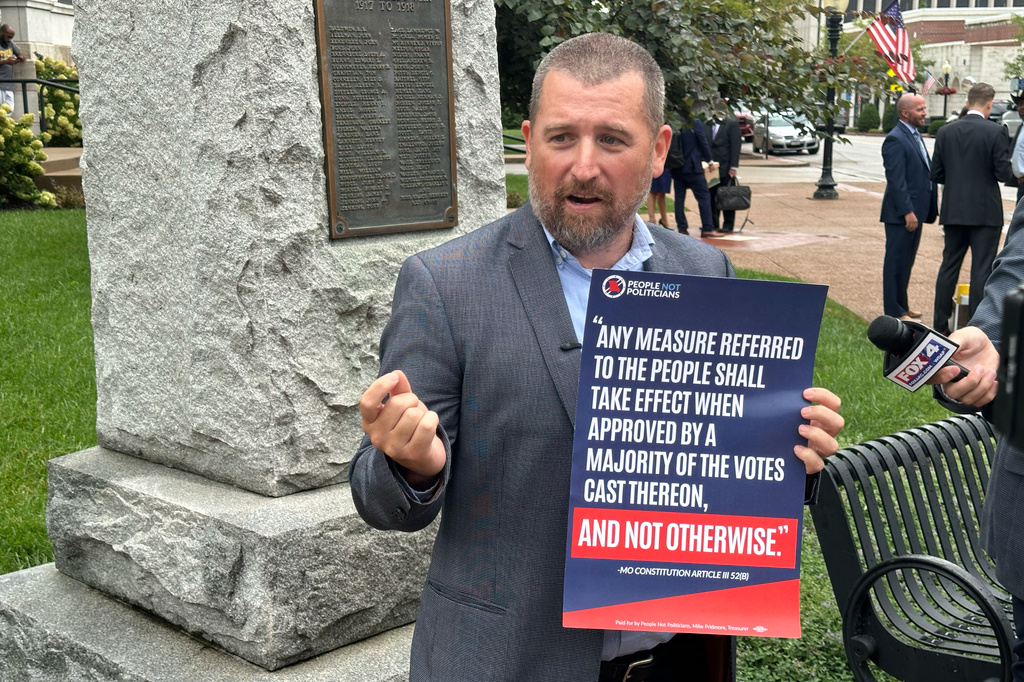 Richard von Glahn, executive director of People Not Politicians, speaks with reporters outside the Cole County Courthouse in Jefferson City, Mo., on Wednesday, Aug. 19, 2026. (AP Photo/David A. Lieb)
