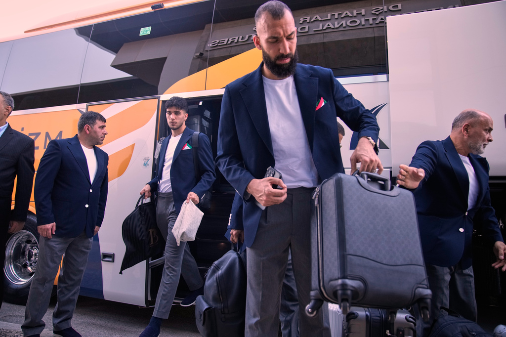 Iran's players arrive at Antalya airport, southern Turkey, Saturday, June 6, 2026, before departing to Tijuana, Mexico, for the World Cup soccer tournament. (AP Photo/Khalil Hamra)