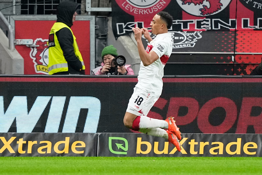 Stuttgart's Jamie Leweling celebrates after scoring his side's opening goal during the German Bundesliga soccer match between Bayer 04 Leverkusen and VfB Stuttgart in Leverkusen, Germany, Saturday, Jan. 10, 2026. (AP Photo/Martin Meissner)