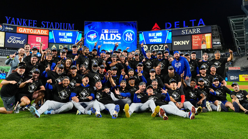 The Toronto Blue Jays gather for a group photo on the field after beating the New York Yankees in Game 4 of baseball's American League Division Series, Wednesday, Oct. 8, 2025, in New York. (AP Photo/Yuki Iwamura) The Toronto Blue Jays gather for a group photo on the field after beating the New York Yankees in Game 4 of baseball's American League Division Series, Wednesday, Oct. 8, 2025, in New York. (AP Photo/Yuki Iwamura)
