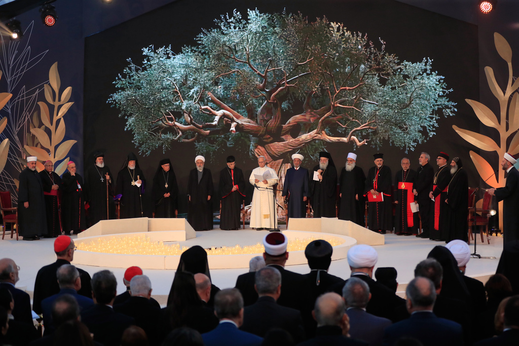 Pope Leo XIV, centre, attends an ecumenical and interreligious meeting at Martyrs' Square in downtown Beirut, Lebanon, Monday, Dec. 1, 2025. (AP Photo/Mohammad Zaatari)