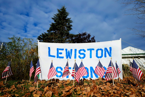 FILE - A make-shift memorial lines Main Street following a deadly mass shooting in Maine, Nov. 3, 2023, in Lewiston, Maine. (AP Photo/Matt York, File) FILE - A make-shift memorial lines Main Street following a deadly mass shooting in Maine, Nov. 3, 2023, in Lewiston, Maine. (AP Photo/Matt York, File)