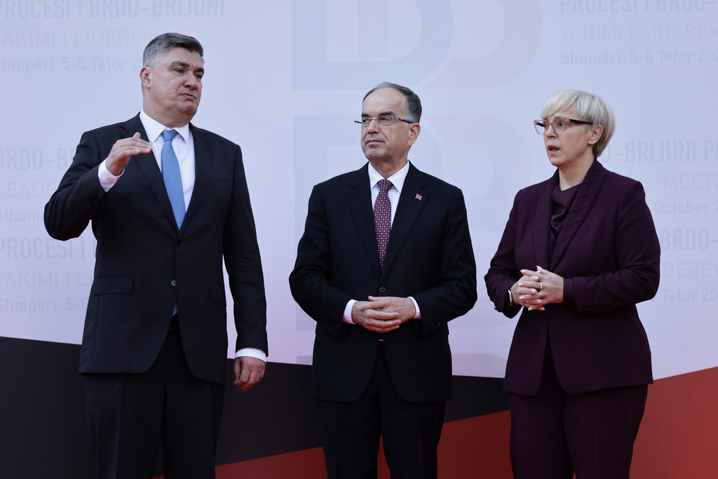 From left to right Croatian President Zoran Milanovic , President of Albania Bajram Begaj, and Natasa Pirc Musar pose for a photo during the Brdo-Brijuni, Process Leaders' Meeting in Golem, Albania, 50 kilometers (30 miles) west of the capital, Tirana , Albania on Monday, Oct. 6, 2025 .(AP Photo/Vlasov Sulaj)