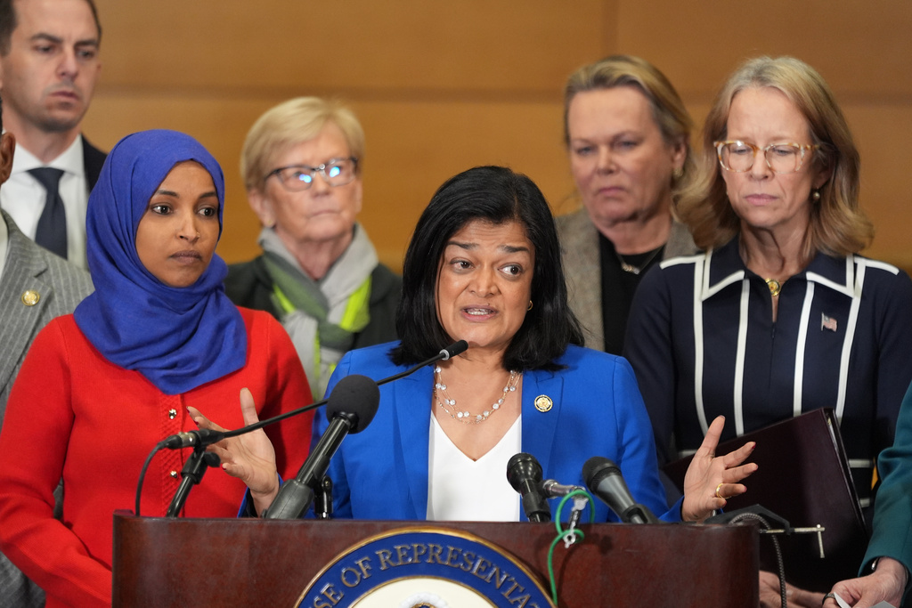 Rep. Pramila Jayapal, D-Wash., middle, speaks during a press conference Friday, Jan. 16, 2026, in St. Paul, Minn. (AP Photo/Abbie Parr)