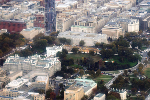 Debris cleanup from the East Wing of the White House and construction of the new ballroom continues, as photographed through an airplane window, Friday, Oct. 24, 2025, in Washington. (AP Photo/Alex Brandon) Debris cleanup from the East Wing of the White House and construction of the new ballroom continues, as photographed through an airplane window, Friday, Oct. 24, 2025, in Washington. (AP Photo/Alex Brandon)