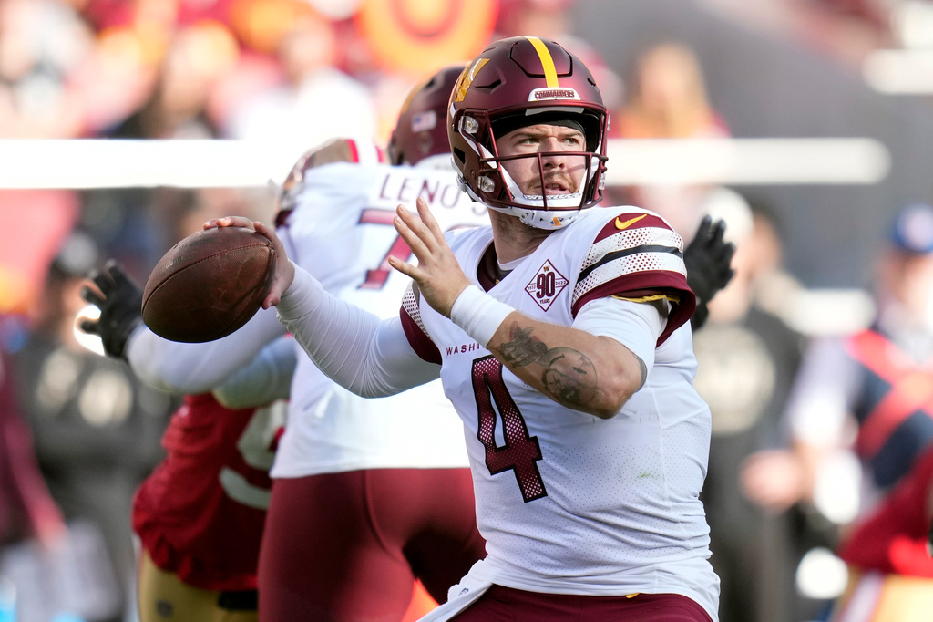 FILE - Washington Commanders quarterback Taylor Heinicke throws a pass in the first half of an NFL football game against the San Francisco 49ers, Dec. 24, 2022, in Santa Clara, Calif. (AP Photo/Godofredo A. Vásquez, File)