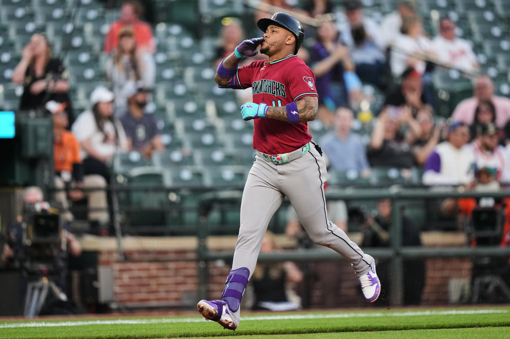 Arizona Diamondbacks' Ketel Marte rounds the bases after hitting a home run during the third inning of a baseball game against the Baltimore Orioles, Monday, April 13, 2026, in Baltimore. (AP Photo/Stephanie Scarbrough)