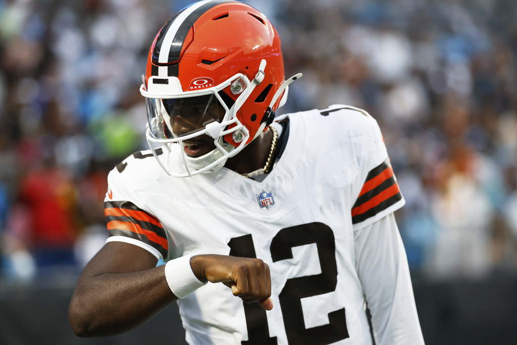 Cleveland Browns quarterback Shedeur Sanders celebrates after his first touchdown pass against the Carolina Panthers during the first half of a preseason NFL football game on Friday, Aug. 8, 2025, in Charlotte, N.C. (AP Photo/Rusty Jones)