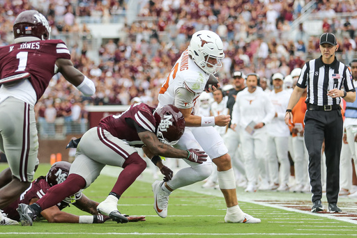 Texas quarterback Arch Manning, center right, runs out of bounds against Mississippi State safety Jahron Manning, center left, during the first half of an NCAA college football game in Starkville, Miss., Saturday, Oct. 25, 2025. (AP Photo/James Pugh) Texas quarterback Arch Manning, center right, runs out of bounds against Mississippi State safety Jahron Manning, center left, during the first half of an NCAA college football game in Starkville, Miss., Saturday, Oct. 25, 2025. (AP Photo/James Pugh)