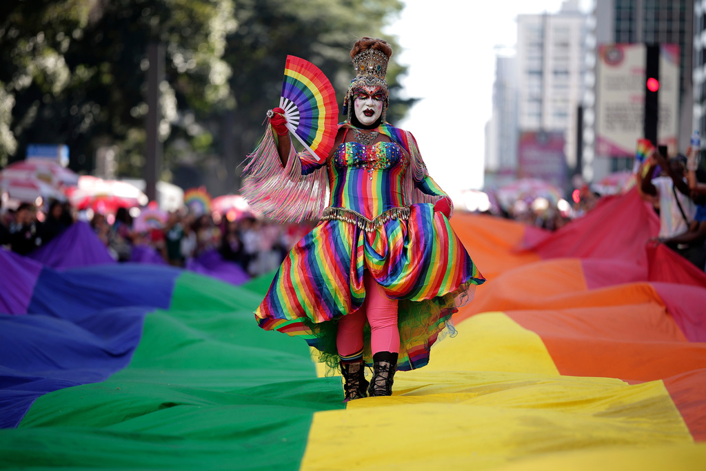 A reveler in costume attends the annual Pride Parade in Sao Paulo, Brazil, Sunday, June 7, 2026. (AP Photo/Ettore Chiereguini)